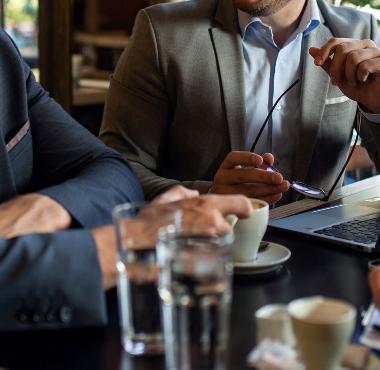 business men in pub drinking tea 